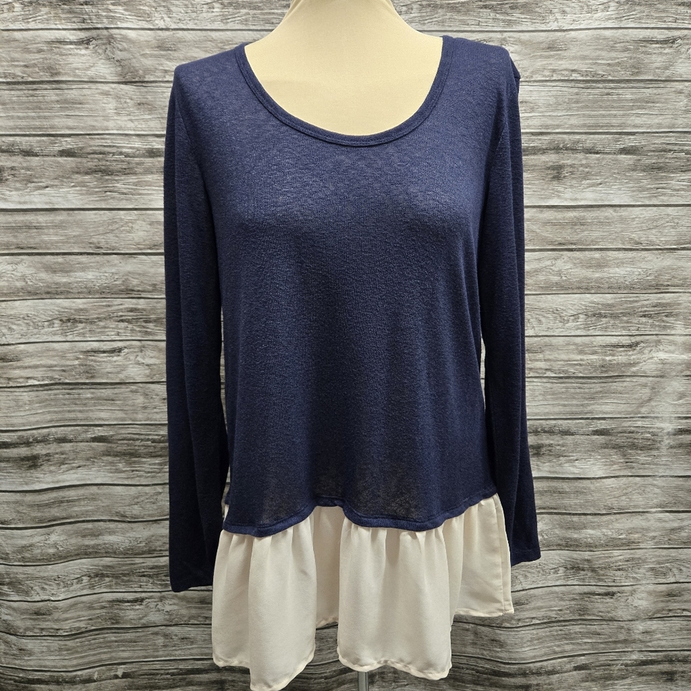 Charming Charlie navy knit top with cream ruffle